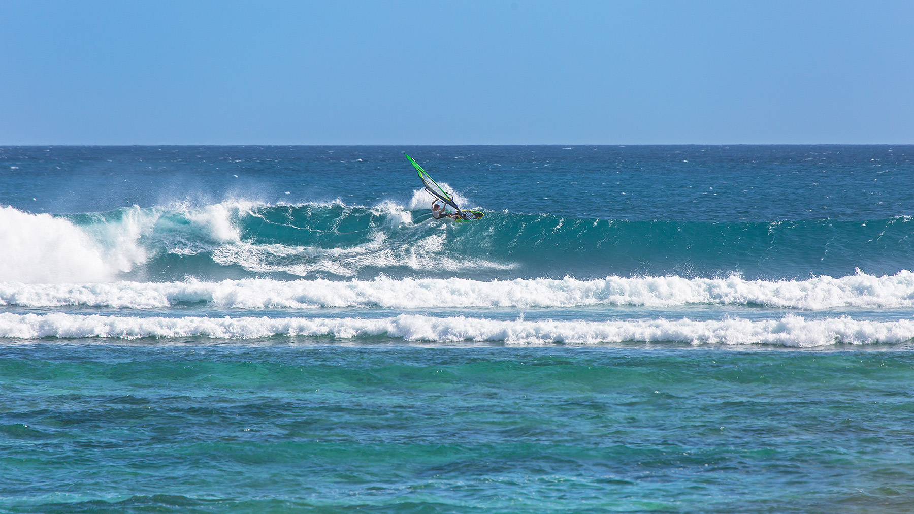 alastair mcleod windsurfing a fun reef break