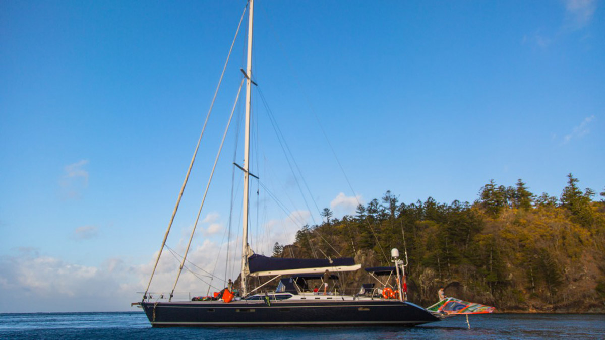 alastair mcleod windsurfing in the whitsundays on the le cochon noir v yacht